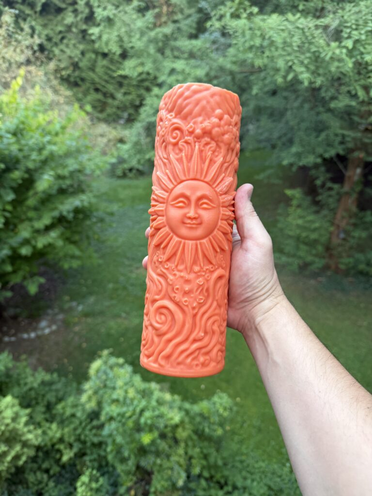 Hand-carved Titan sun candle with its relief intact